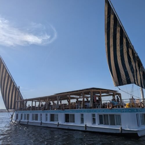 Dahabeya under sail on the Nile between Luxor and Aswan