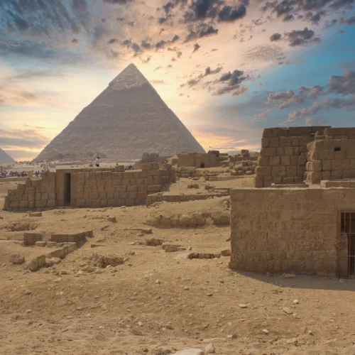 The Great Pyramid at Giza at dawn, with the mastaba tombs of the eastern cemetery in the foreground