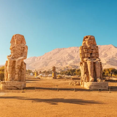 The Colossi of Memnon standing alone on the Luxor West Bank