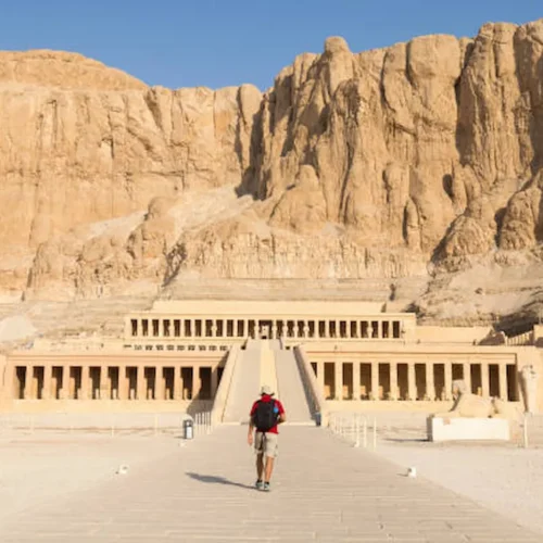 A single visitor on the ramp of Hatshepsut's temple at Deir el-Bahari