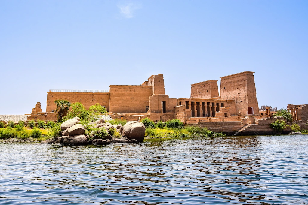 The Temple of Philae on its island in the Nile at Aswan, seen from the water